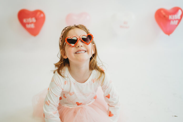 Playful child portrait from Valentine’s Day mini sessions at Selfie Space Studio