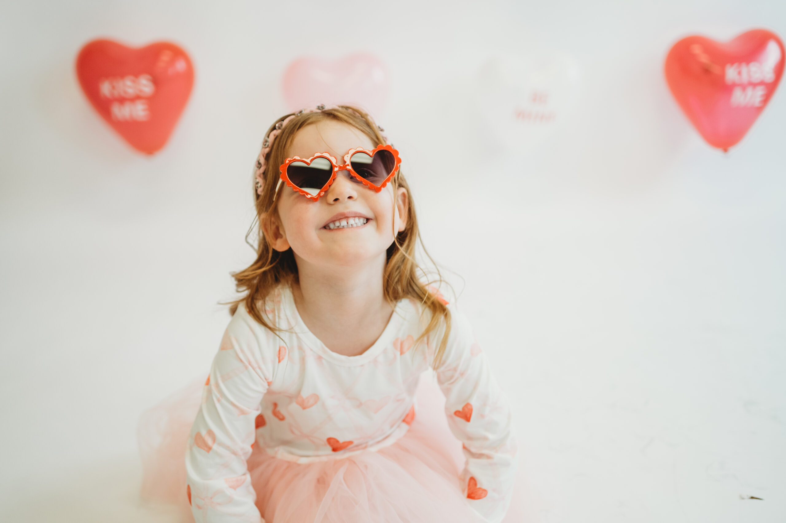 Playful child portrait from Valentine’s Day mini sessions at Selfie Space Studio