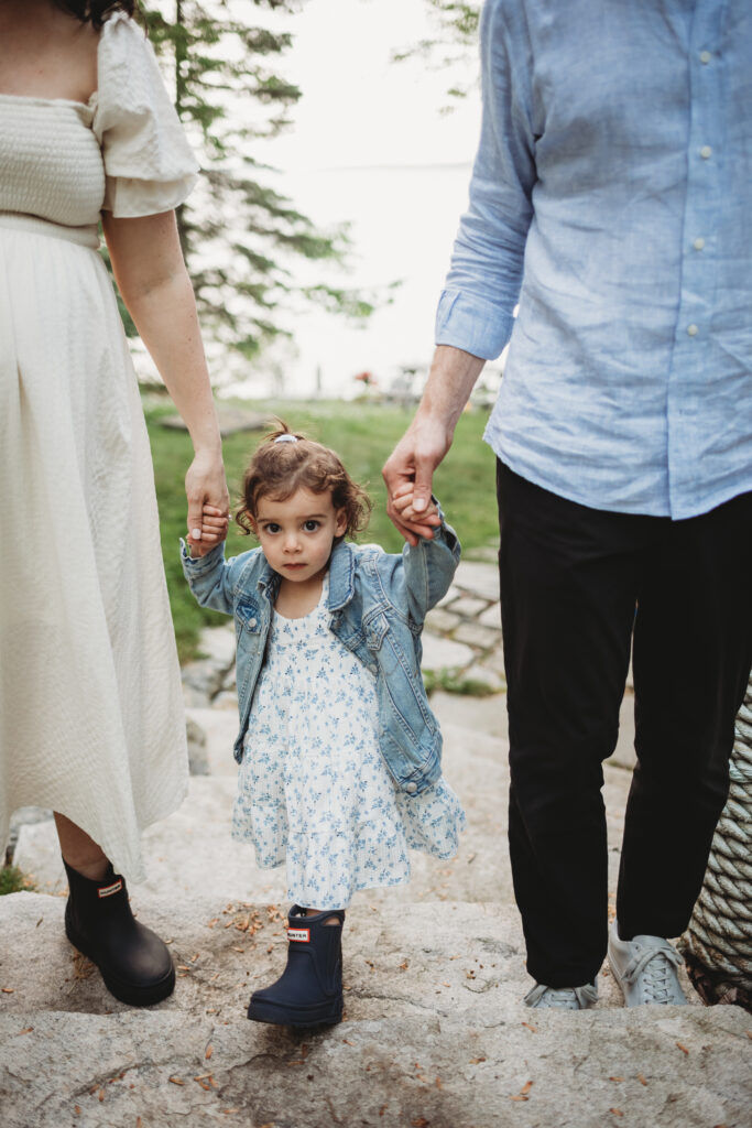 Blue Hill Maine maternity photography showcasing family cottage by the sea