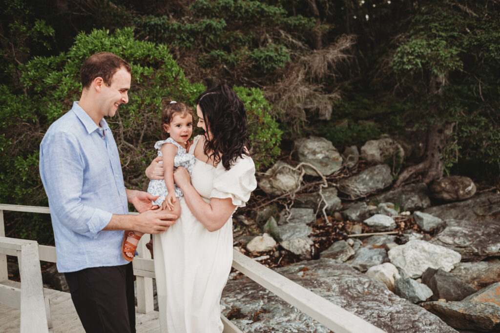 Maternity and family photos in Blue Hill Maine with toddler and ocean view