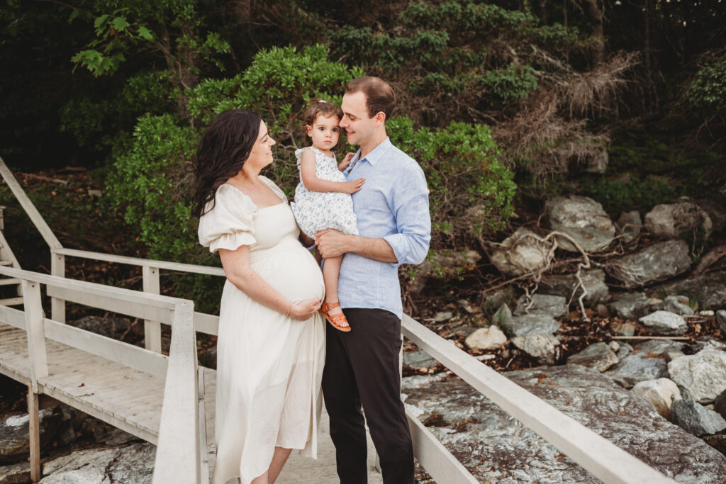 Maternity and family photos in Blue Hill Maine with toddler and ocean view